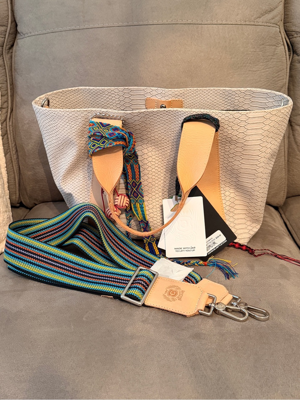 Consuela Thunderbird Carryall Cream Textured Tote with Tan Straps and Red Tassel - Picture 5 of 5